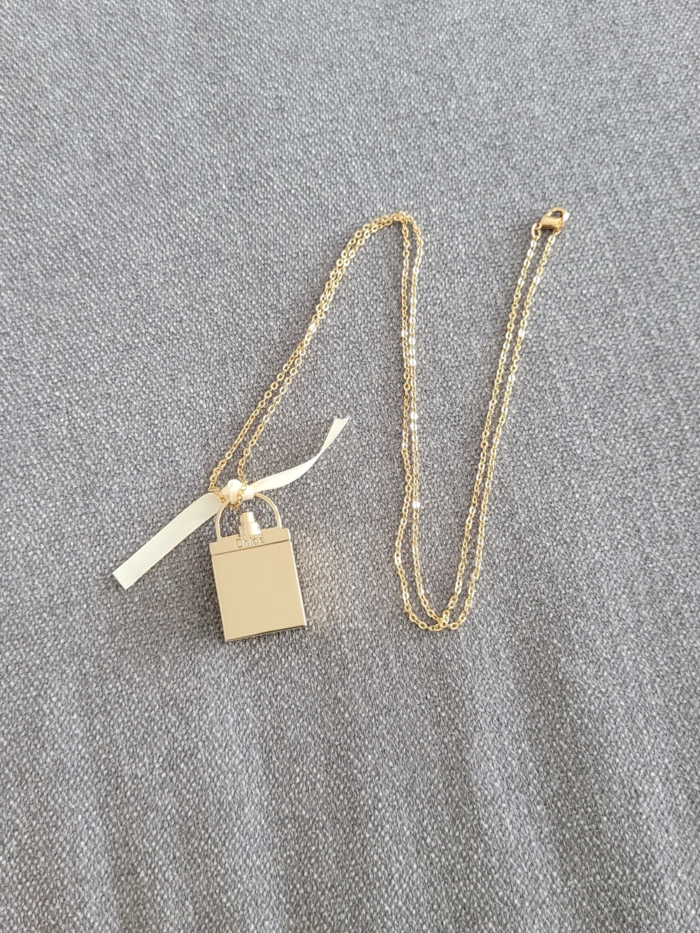 Chloe Gold-Tone Perfume Bottle Pendant Necklace - Picture 2 of 4